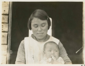Image of Young Eskimo [Inuit] mother and baby